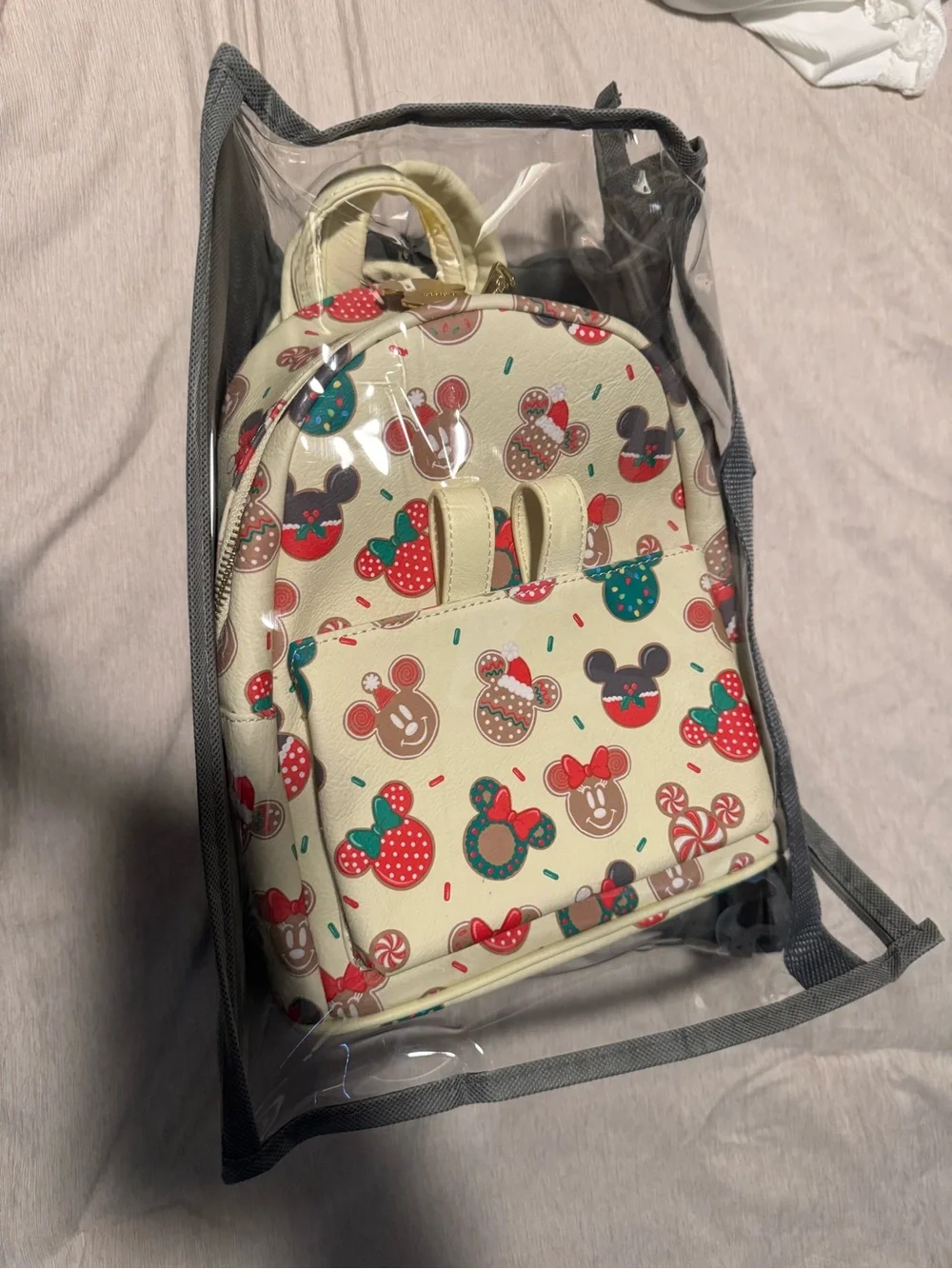 Loungefly Cream Mini Backpack with Festive Character Print